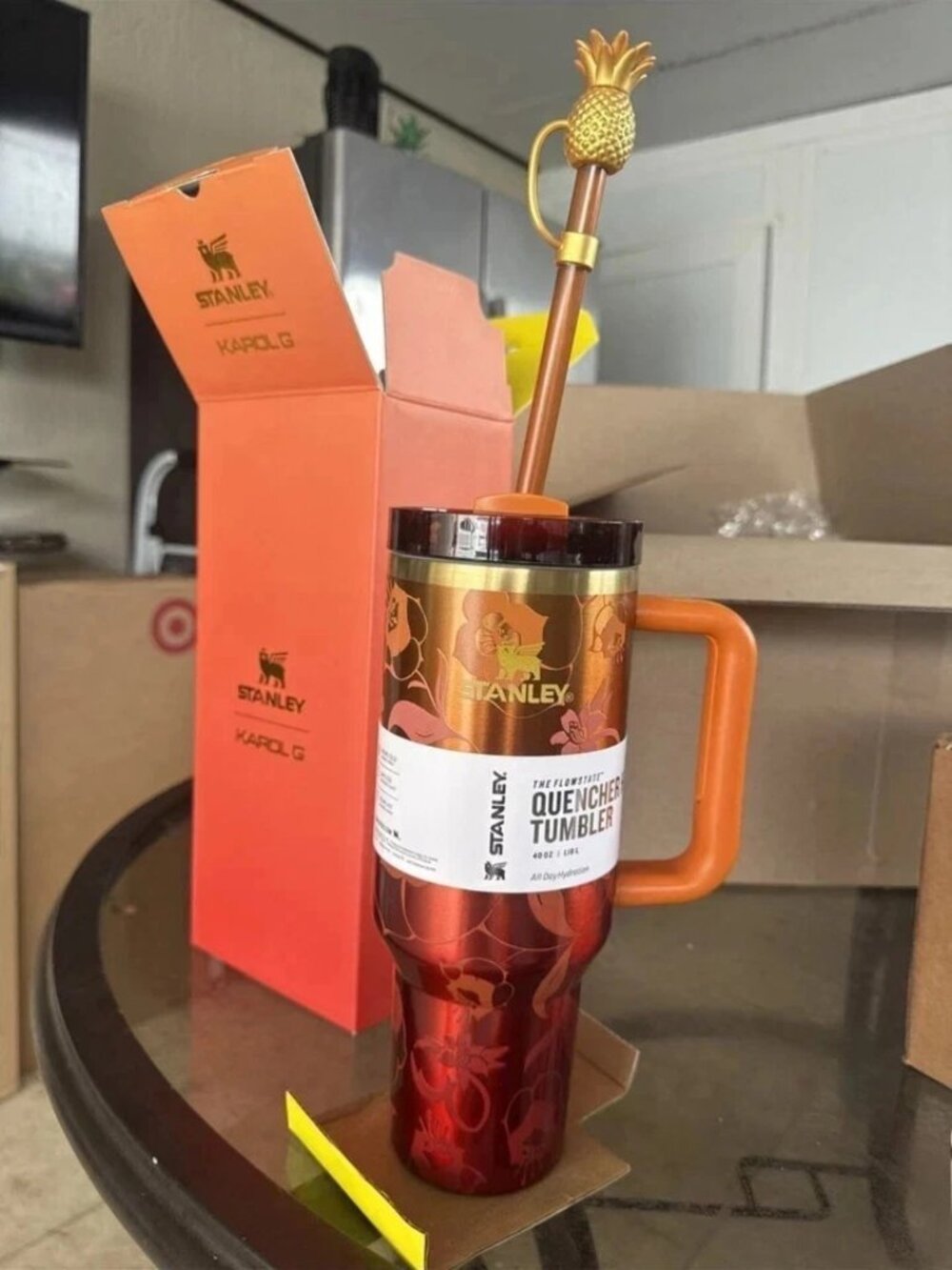 The Stanley 1913 x KAROL G 40 oz Quencher H2.O FlowState Tumbler